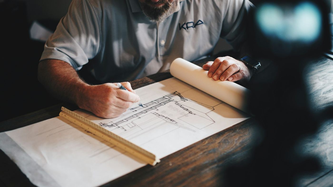 Architect drafting construction documents